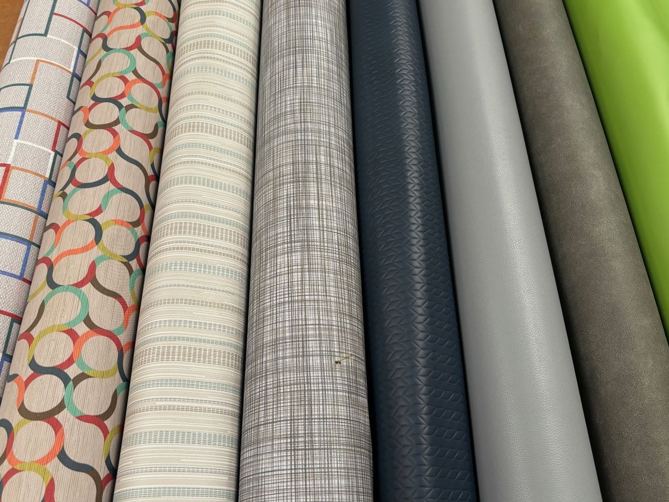 Assorted upholstery fabric rolls